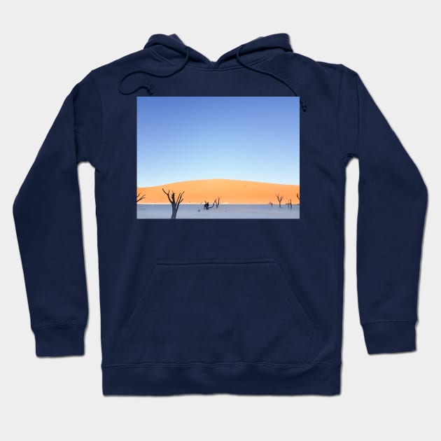 Sossusvlei dunes  landscape at Dead Vlei old trees, orange dunes dead tree and tourist in silhouette on salt pan Hoodie by brians101